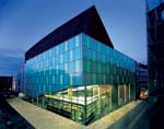 The Dortmund Concert Hall shimmers against the evening sky.